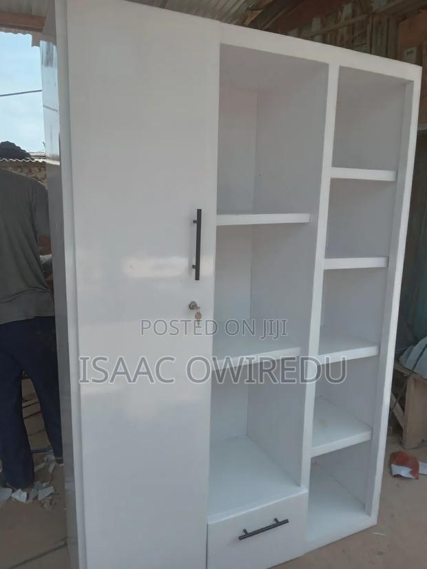 Single Door Wardrobe With Shelves · Photo 1