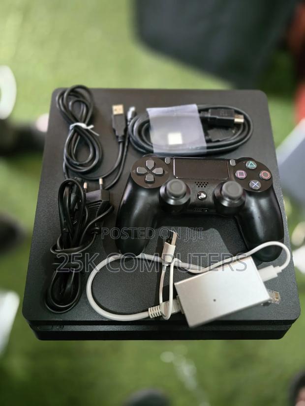 Playstation 4 Slim With 11 Games · Photo 3