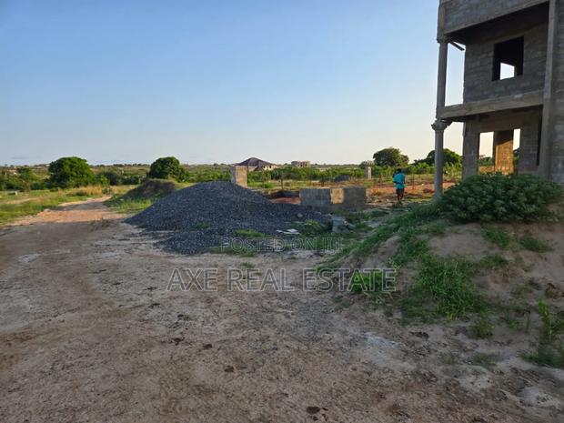 Neatly Demarcated Plus Pillars ! Plots at Prampram · Photo 1