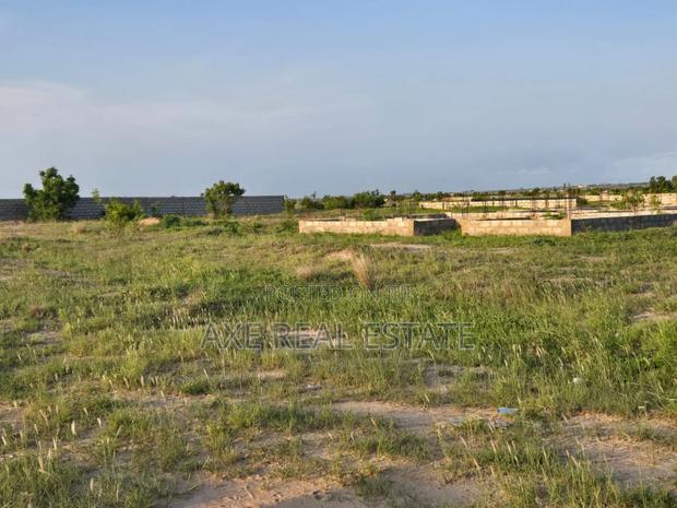 Neatly Demarcated Plus Pillars ! Plots at Prampram · Photo 2