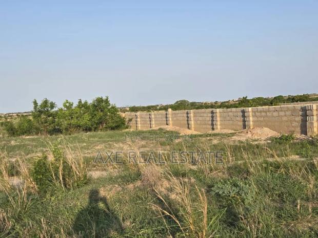 Well Serviced Half Plot! Litigation Free at Prampram · Photo 2