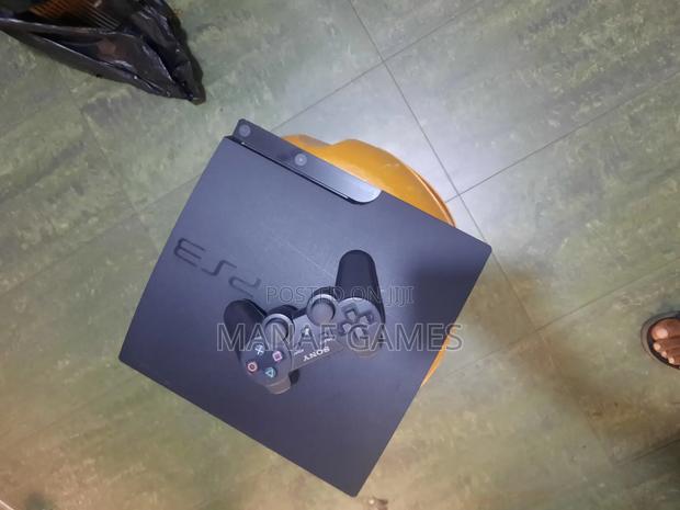 Playstation 3 Slim · Photo 1
