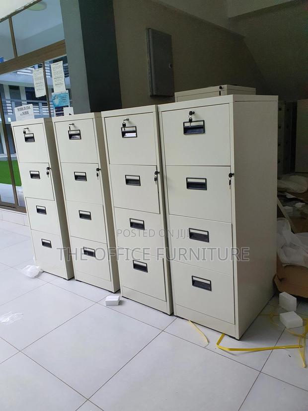 Fire Proof Four Drawer Cabinet With Safe · Photo 1