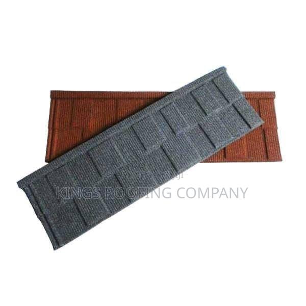 Diffrent Color Grades of Shingle Roofing Tiles · Photo 1