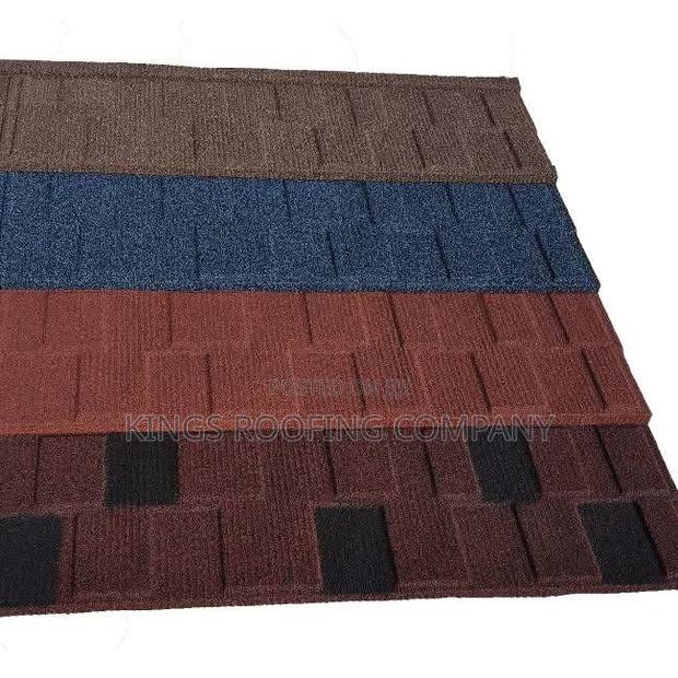 Diffrent Color Grades of Shingle Roofing Tiles · Photo 2