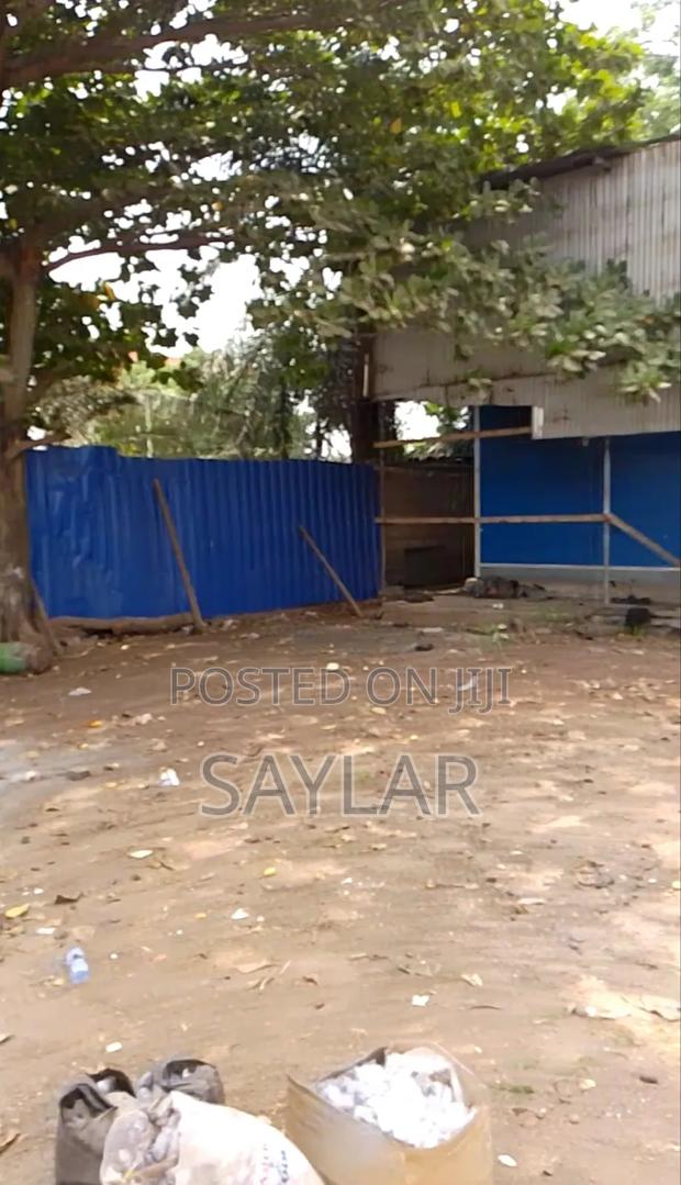 T. D. C Documents 3 and Half Plots Property at Comm12 Tema · Photo 4