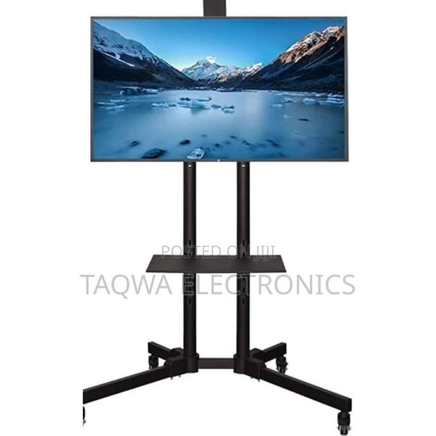 Moving// Tv Stand-32 to 70 Tv Stand · Photo 1