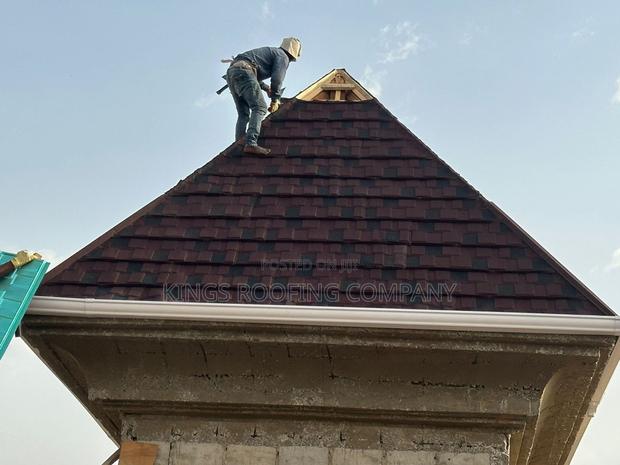Well Decorated Shingles Project by Kings Roofing · Photo 1