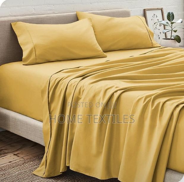2 Yellow Bedsheet With 4 Pillow Cases · Photo 1