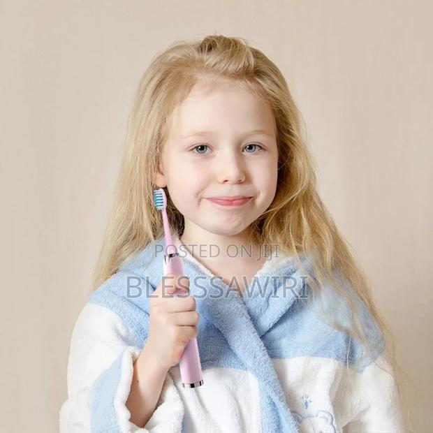Rechargeable Electric Toothbrush for Kids · Photo 1