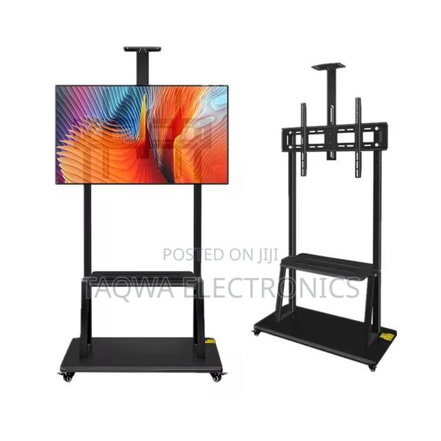 Up to 75 Inches Universal Mobility Tv Stand · Photo 1