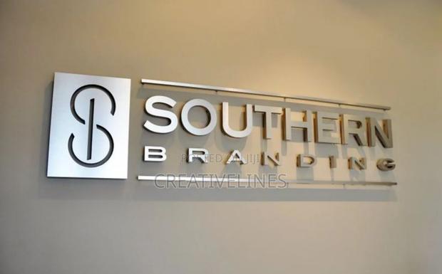 Signage on the Wall · Photo 2
