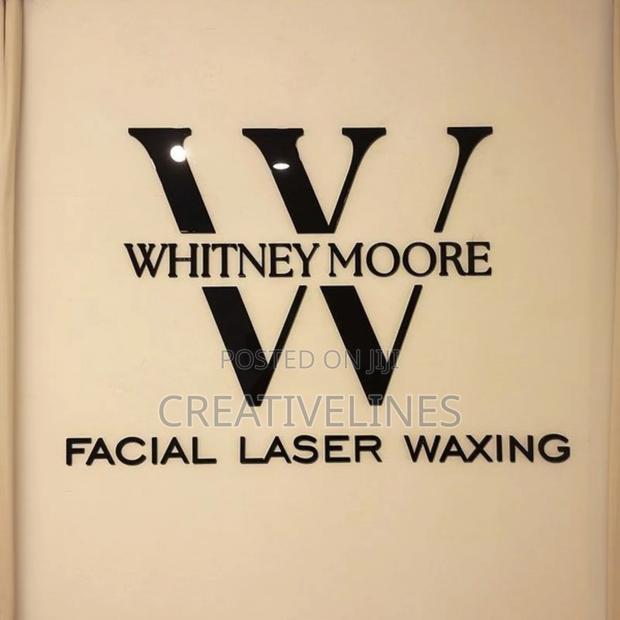 Signage on the Wall · Photo 3