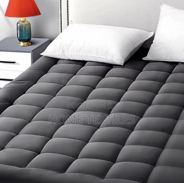 Mattress Toppers Available for Both King and Queen Size Beds · Photo 1