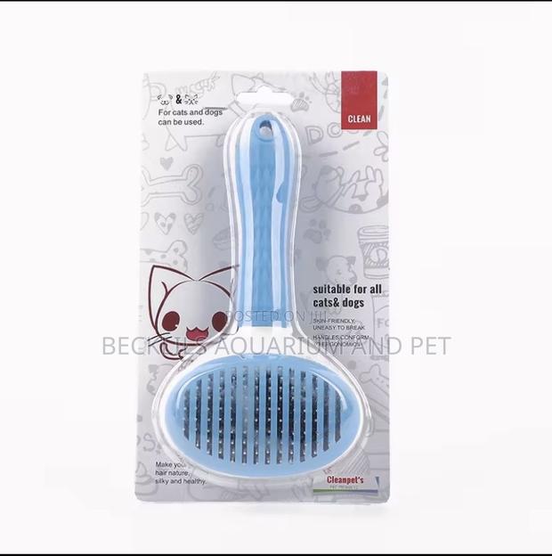 Pet Self Cleaning Comb · Photo 2