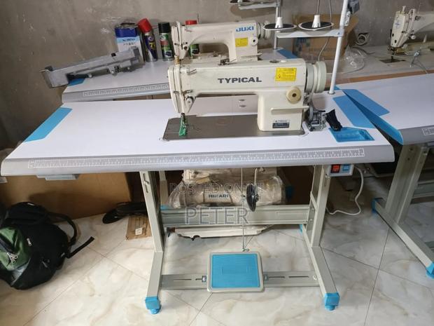 Typical Sewing Machine. In Kumasi Accra. · Photo 3