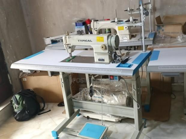 Typical Sewing Machine. In Kumasi Accra. · Photo 2