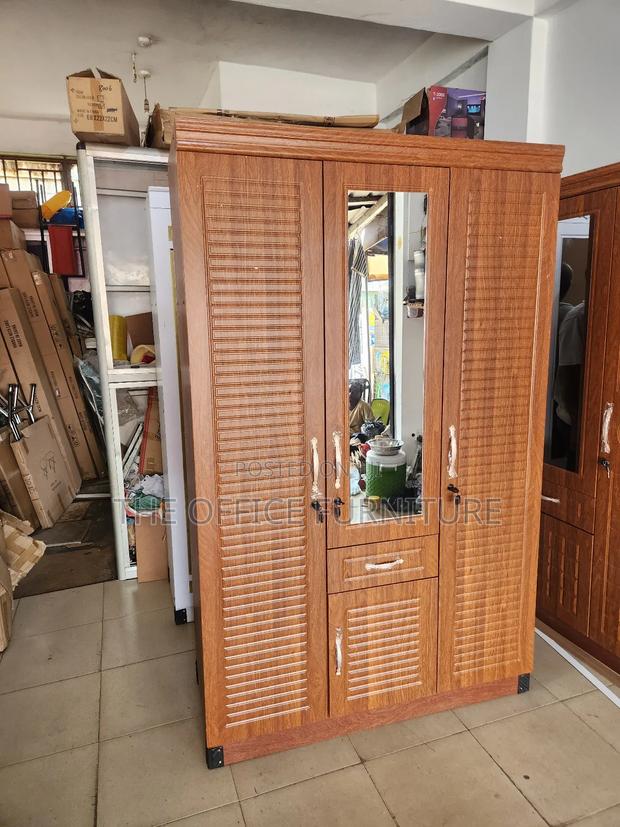 Three Doors Wardrobe ( Brown) · Photo 1