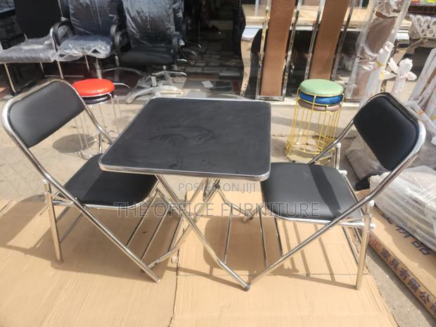 Quality Foldable Table With Two Matching Chairs · Photo 1