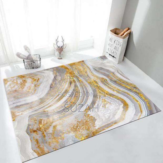 Designer Gold Stripes on White Carpet · Photo 1
