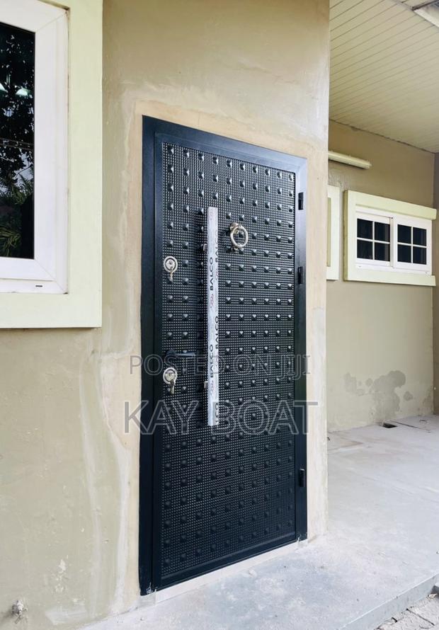 Black Metal Door for Back Door · Photo 1