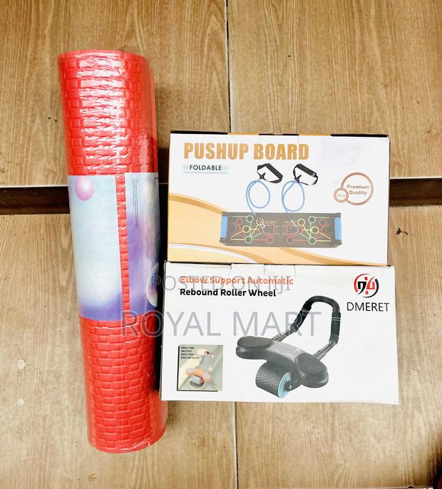 Abs Roller, Push Up Board and Yoga Mat · Photo 1