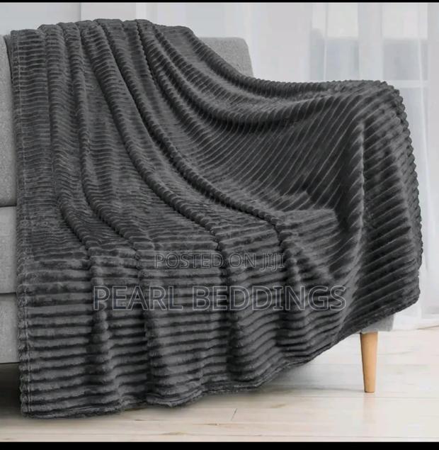 Quality Plush Throw Blanket Available In Different Colors · Photo 2