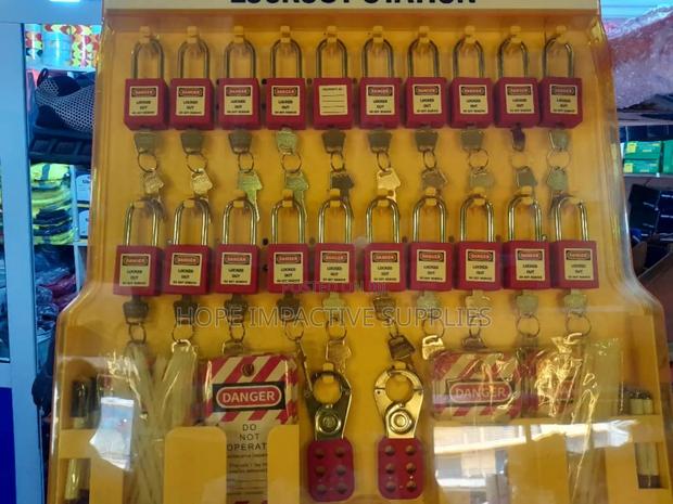 Safety Lockout Station With Padlocks. · Photo 1
