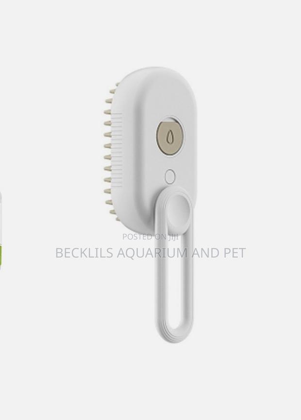 3 in 1 Cat and Dog Steamy Pet Grooming Massage Brush · Photo 1