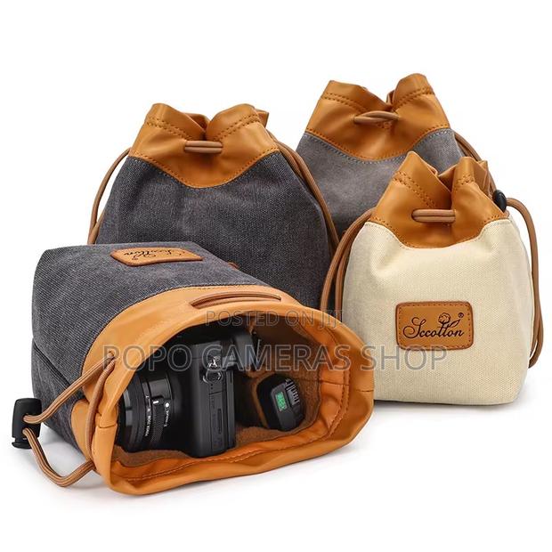 Mini Canvas and Leather Camera Bag at 210 Cedis · Photo 1
