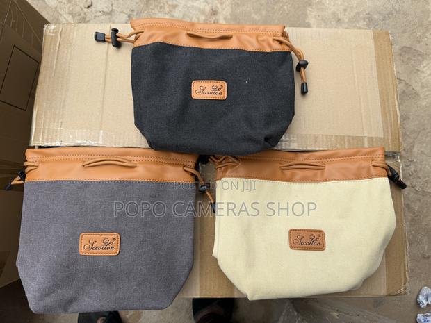 Mini Canvas and Leather Camera Bag at 210 Cedis · Photo 4