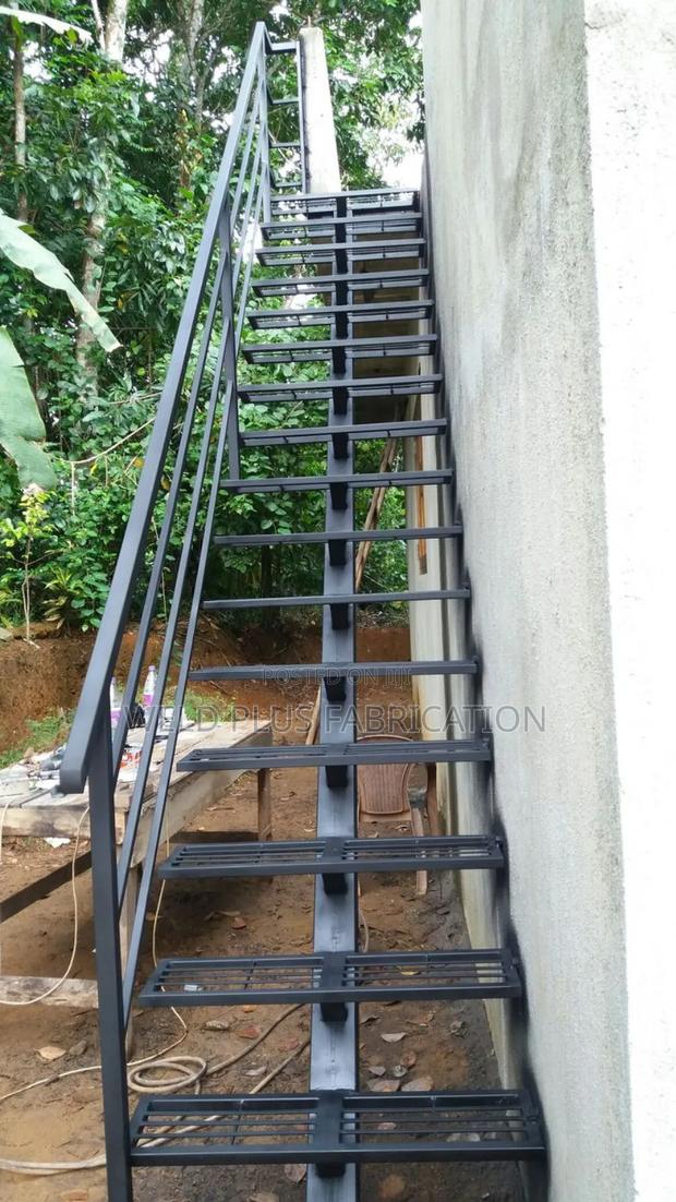 Metal Staircase With Ballustrade · Photo 1