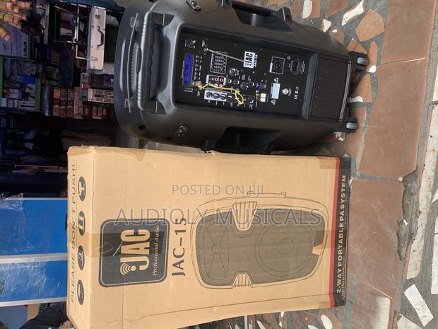15- Inches Rechargeable With Two Mic and a Stand · Photo 1