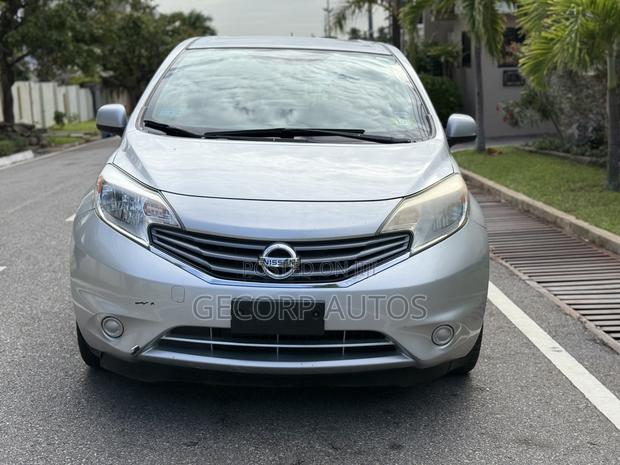 Nissan Versa 1.6 S 4dr Sedan (1.6L 4cyl 5M) 2014 Silver · Photo 2