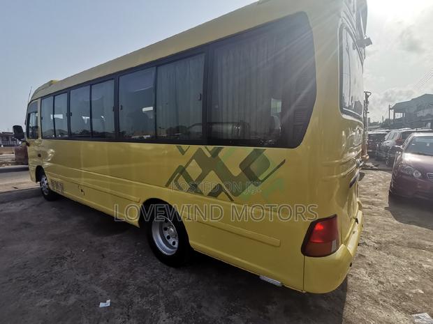 Hyundai County 2012 Yellow · Photo 5