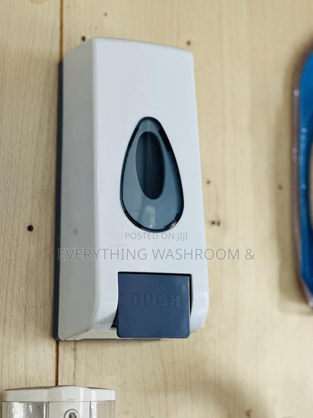 Wall-Mounted Manual Soap Dispenser · Photo 1
