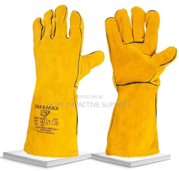 Welding Gloves - Yellow. · Photo 1