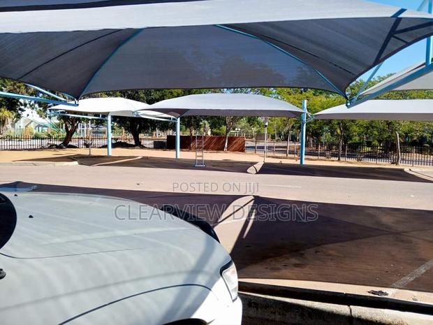 Premium Double Carport Canopy · Photo 1