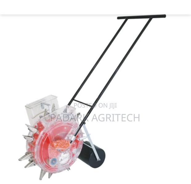 2 in 1 Seeder and Fertilizer · Photo 1