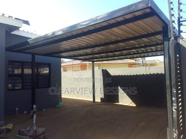 Contemporary Metal Pergola · Photo 1
