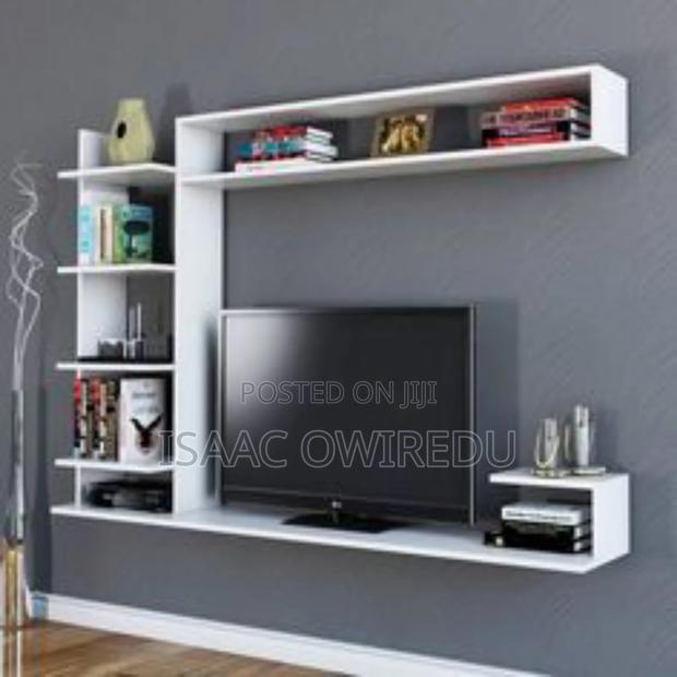 Television Wall Mount Design With Multi Shelves · Photo 1