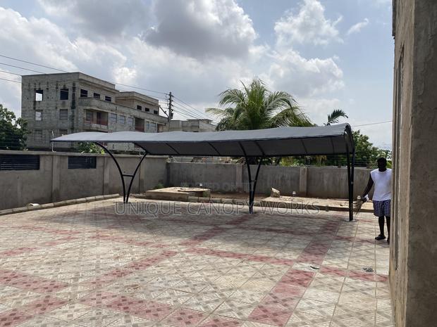 Durable Y Designed Carport · Photo 1