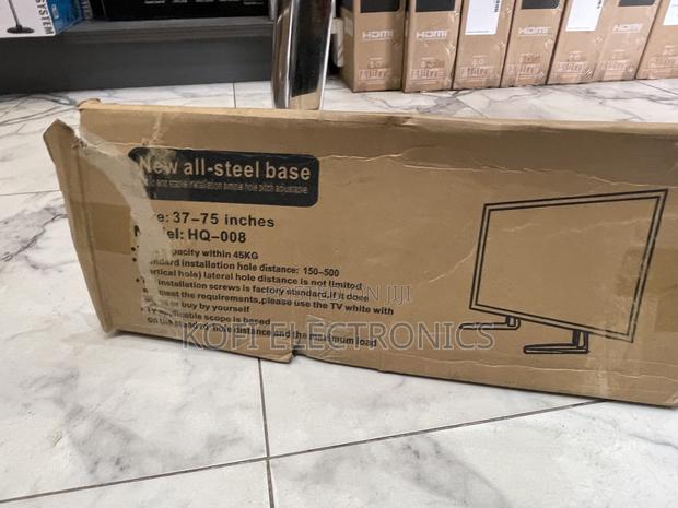 Improve Room Set Up With Adjustable Metal Tv Stand Legs · Photo 1