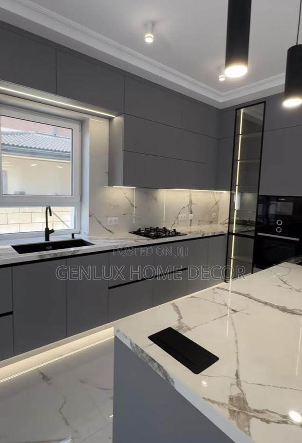 Luxury Kitchen Cabinets With Marble-Top Island · Photo 1