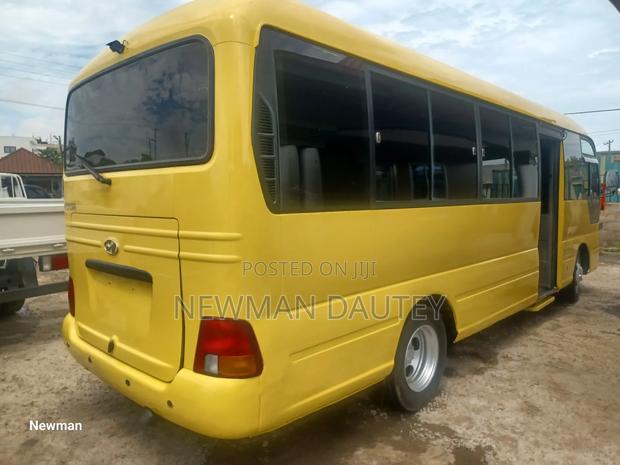 Hyundai County 2014 Yellow · Photo 4