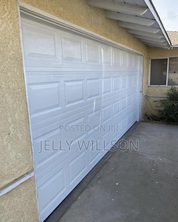 16 Feet X 8 Feet Garage Door White · Photo 1