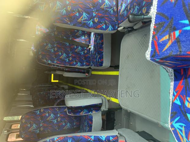 Toyota Coaster 2014 Yellow · Photo 5