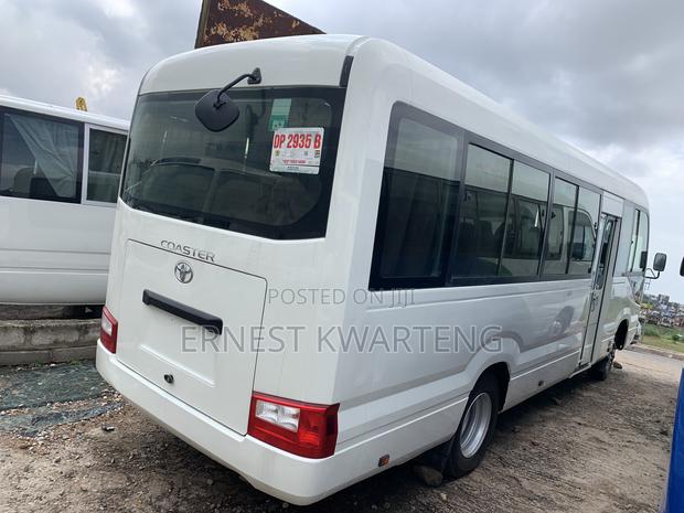 Toyota Coaster 2019 White · Photo 3