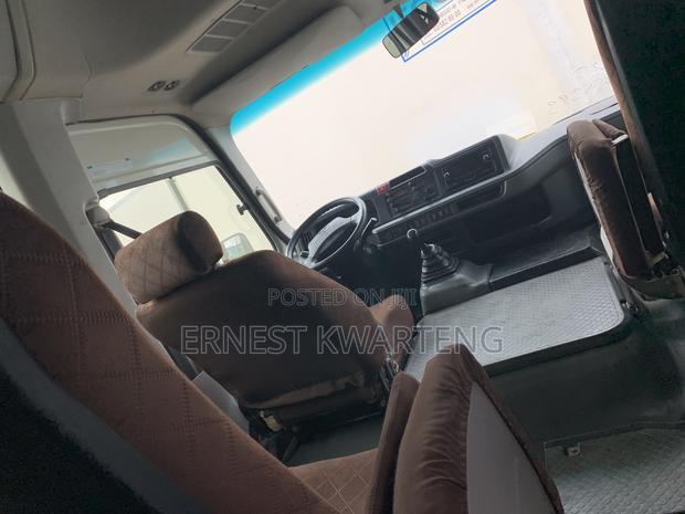 Toyota Coaster 2019 White · Photo 5