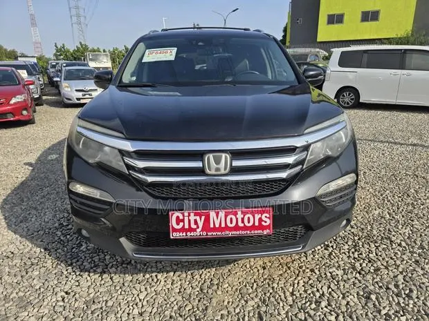 Honda Pilot Touring 4dr SUV 4WD (3.5L 6cyl 9A) 2016 Black · Photo 1